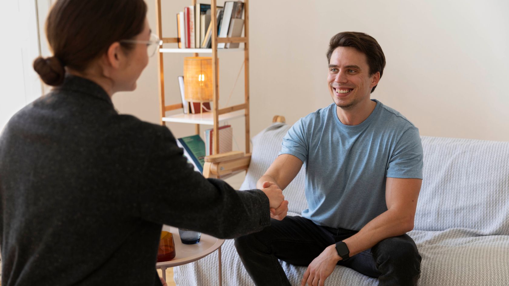 A therapist greets a client during outpatient rehab in Atlanta. 