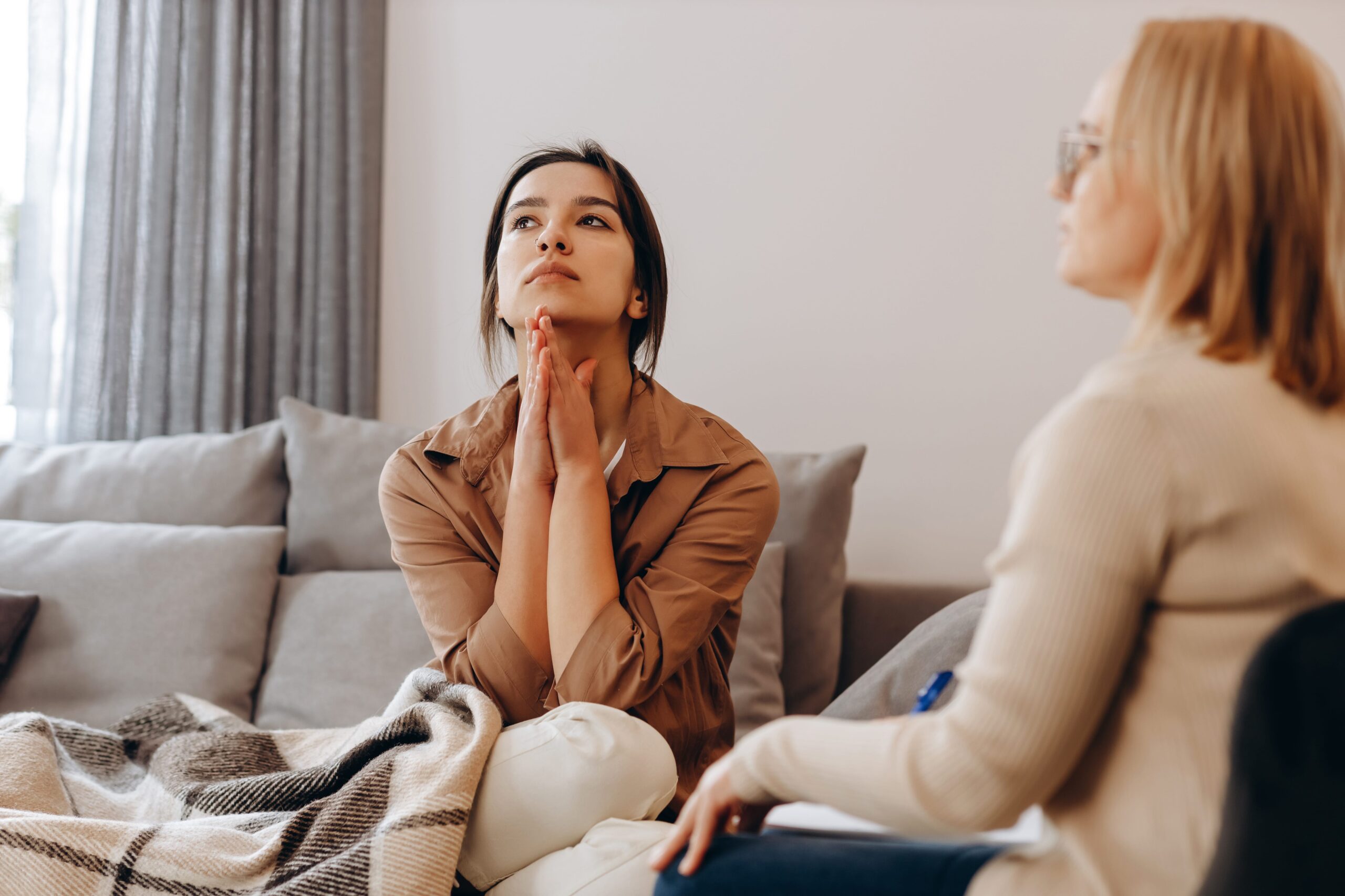 A woman expresses her feelings during anxiety treatment atlanta