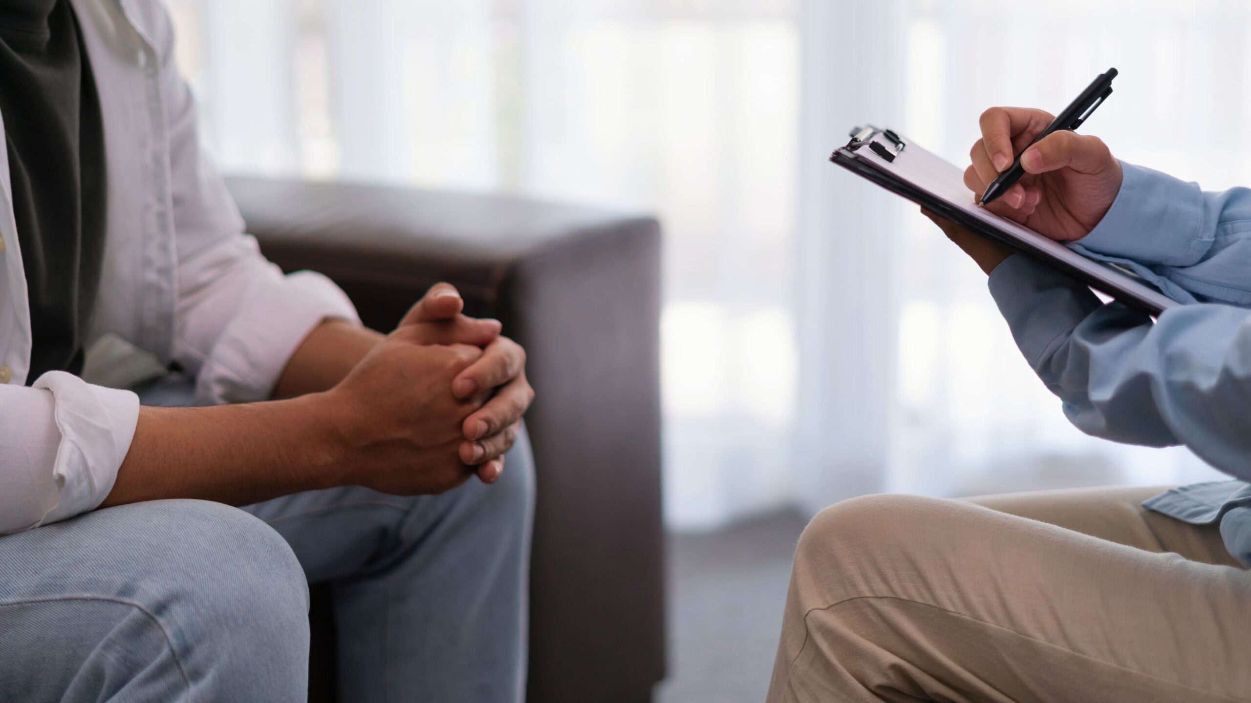 A professional conducting an assessment during inpatient rehab in Atlanta.